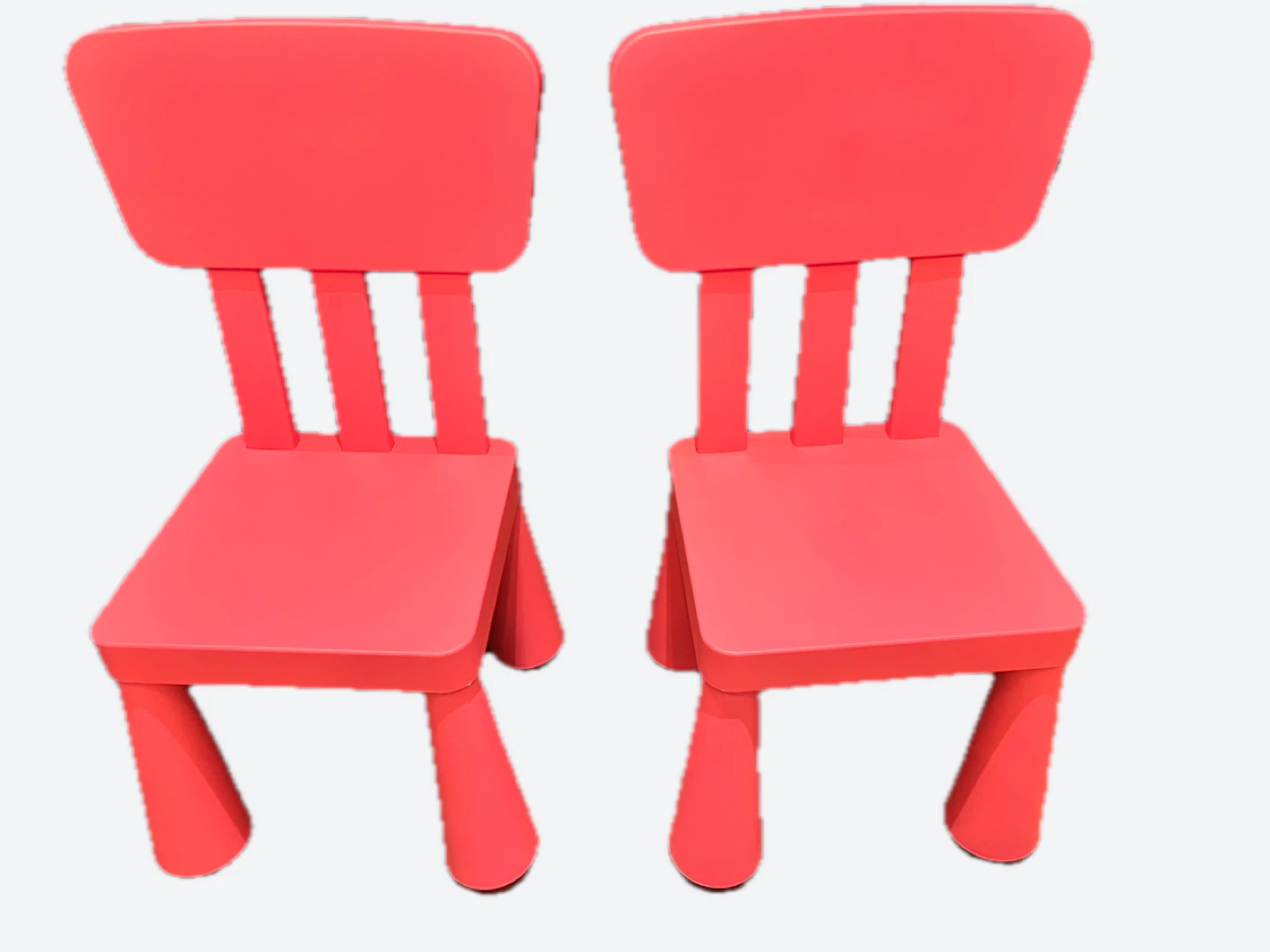 Two Pink Ikea Mammut Chairs