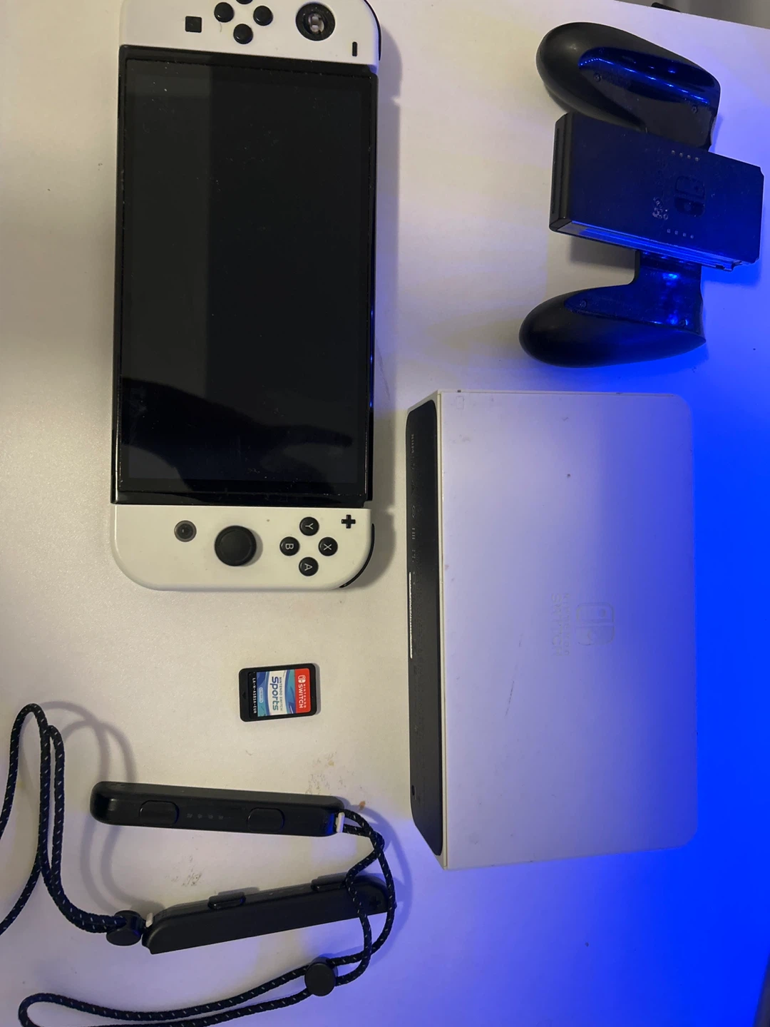 Nintendo Switch OLED in white with nintendo switch sports