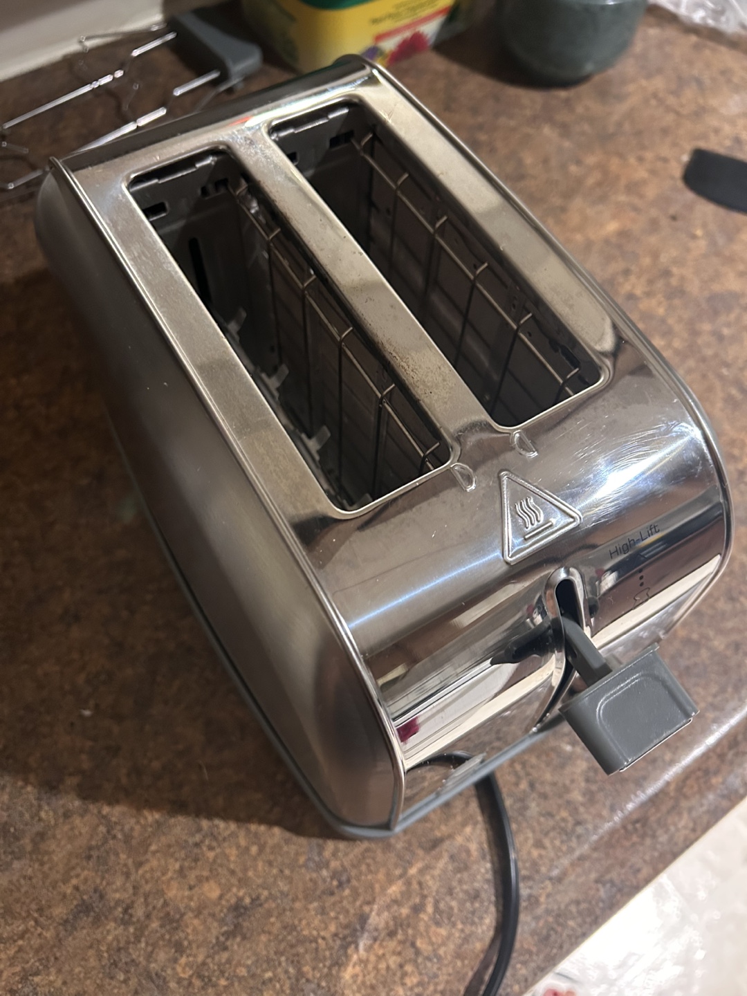 Bread toaster with warming rack for croissants