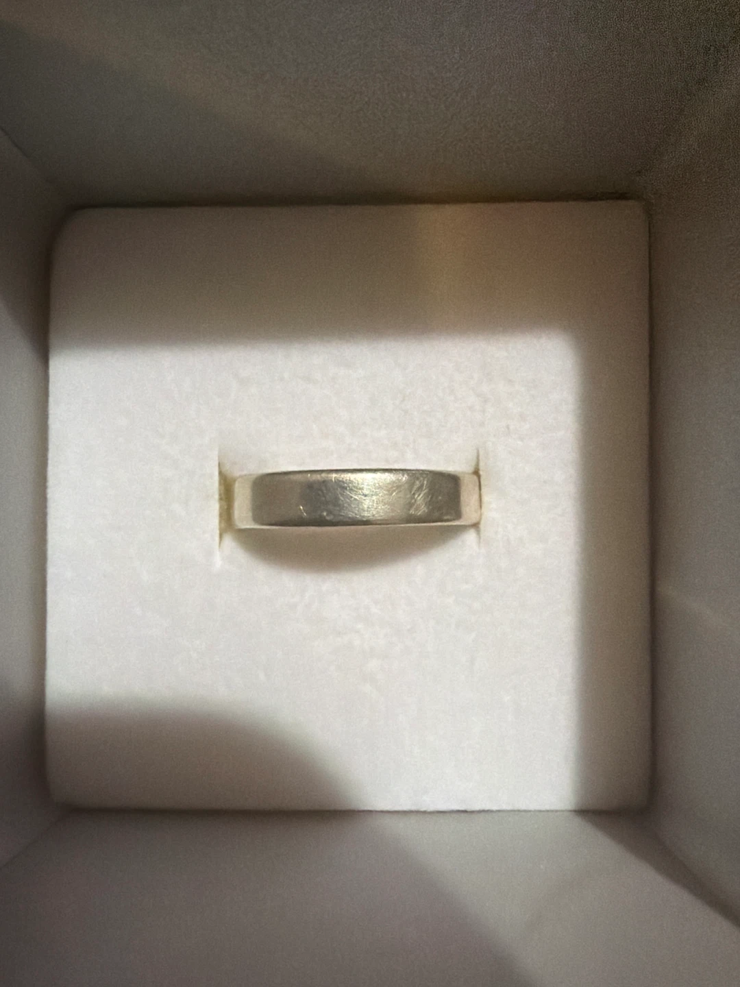 Silver band ring in box