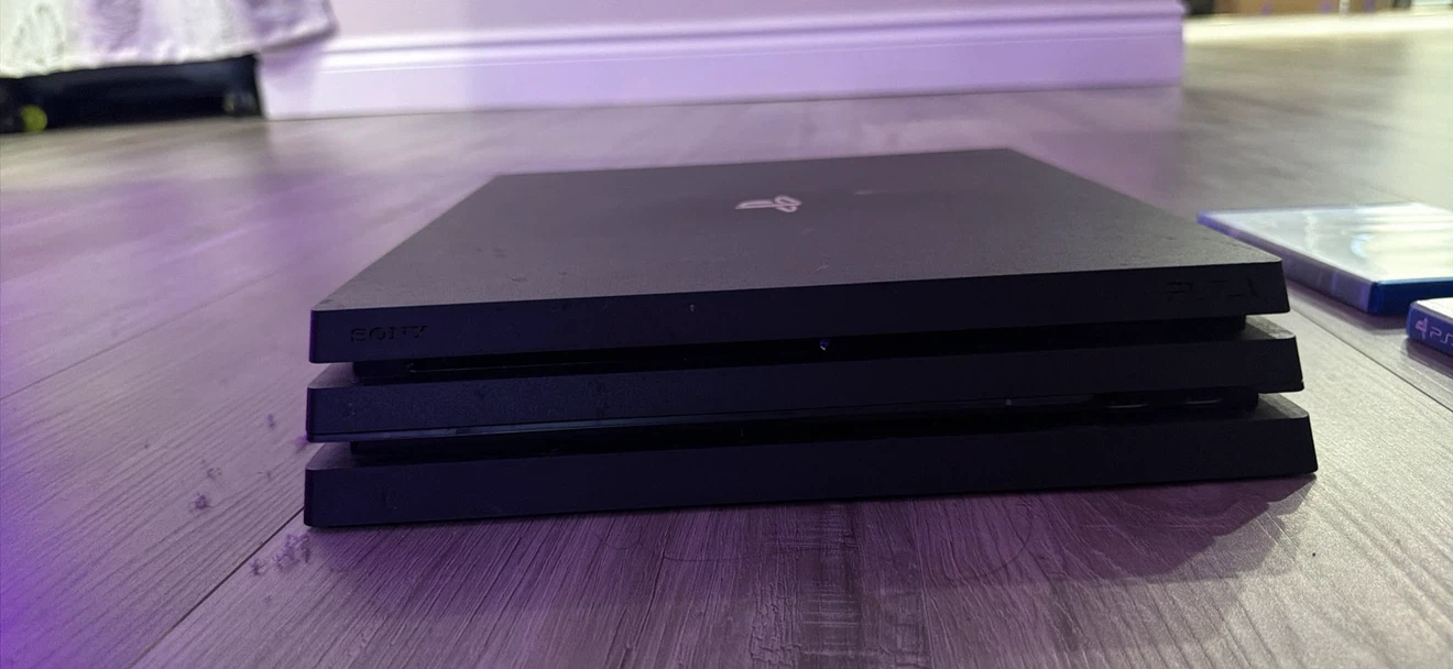 Sony PlayStation 4 Pro Console with Games and Controller - photo 2