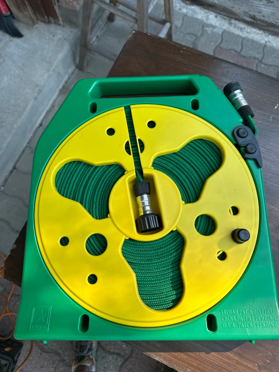 Green and Yellow Hose Reel with Hose