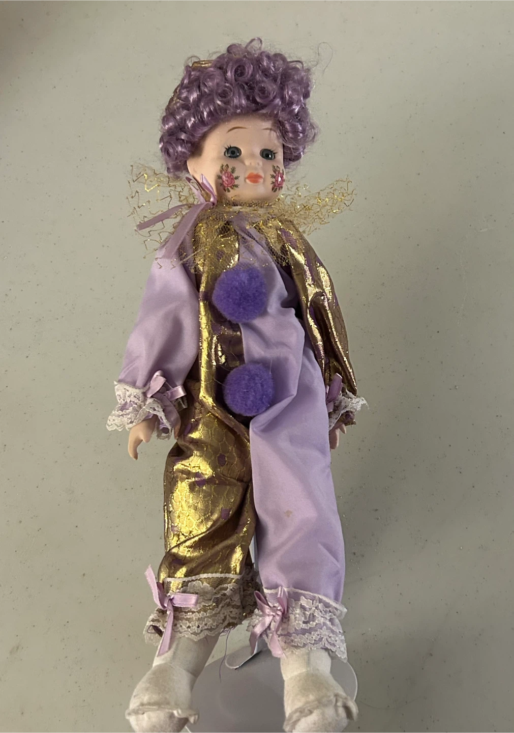 Porcelain Clown Collector’s Doll with Purple & Gold Outfit