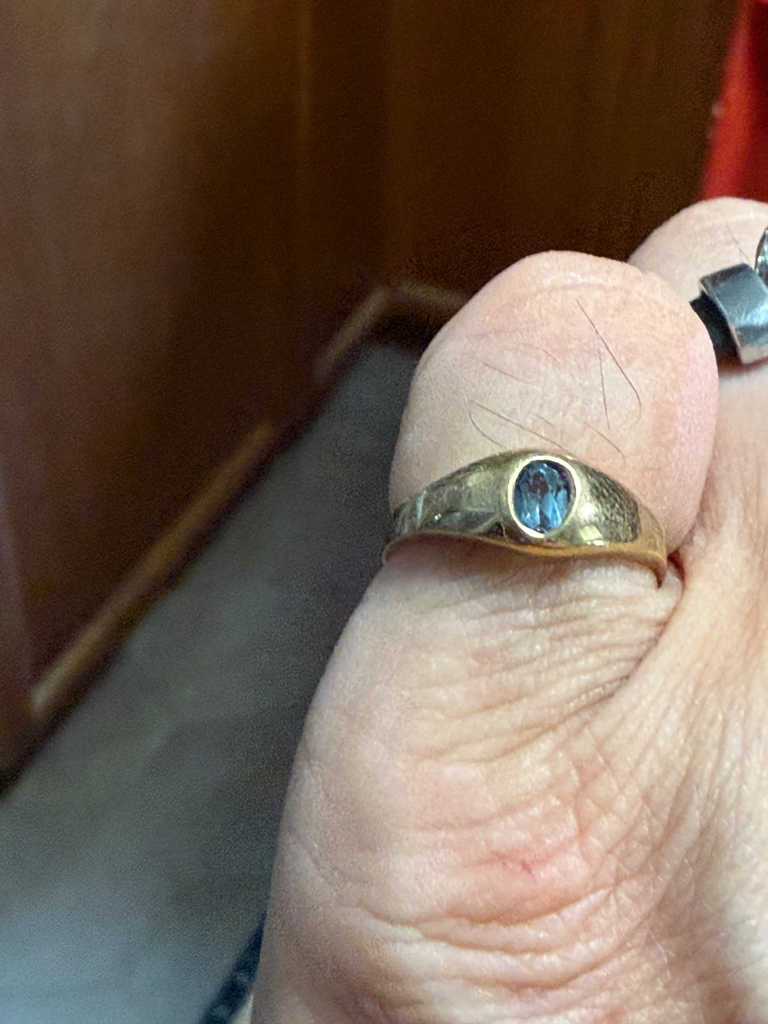 Gold ring with sapphire gemstone