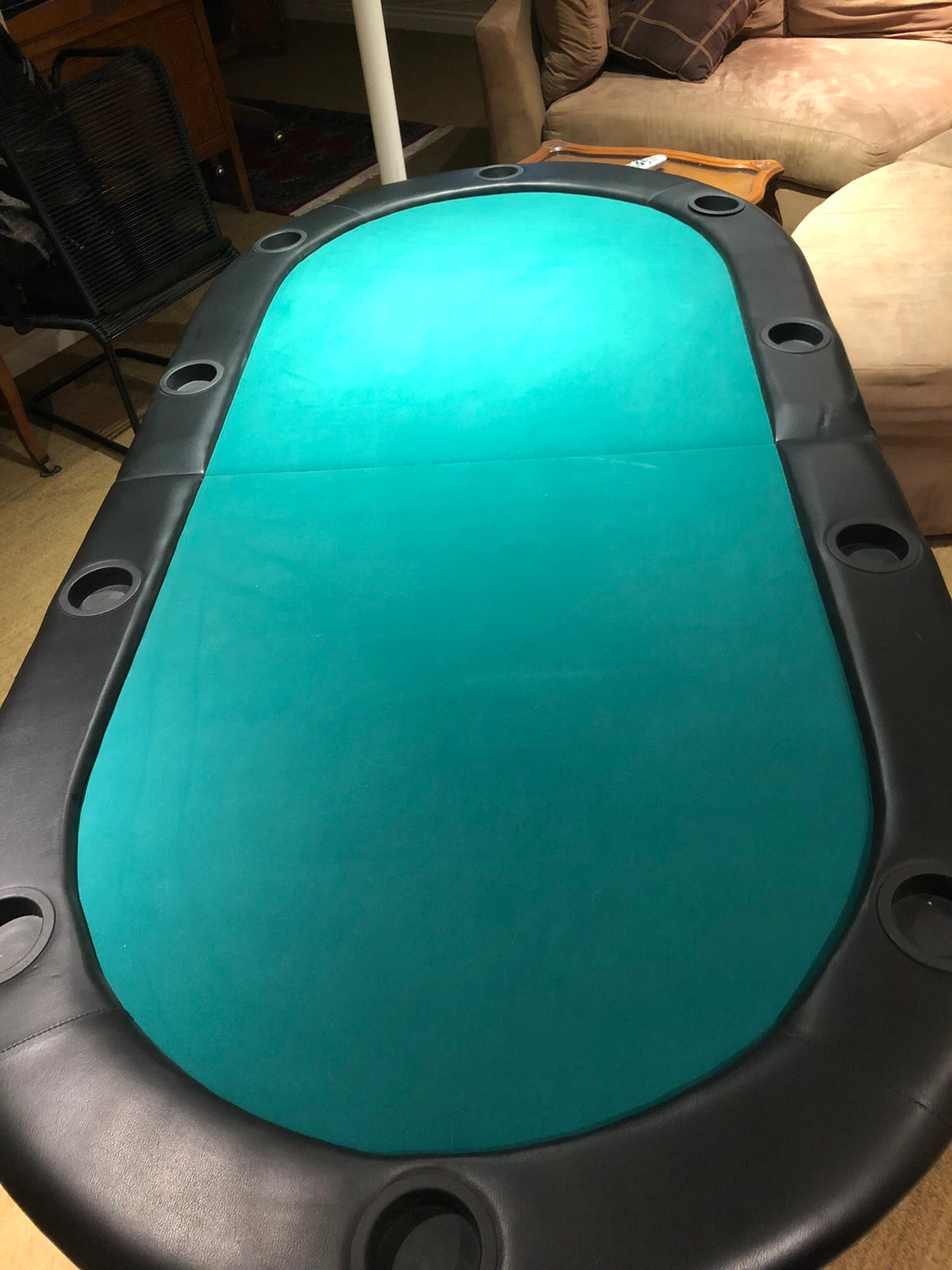 Folding poker table with cup holders