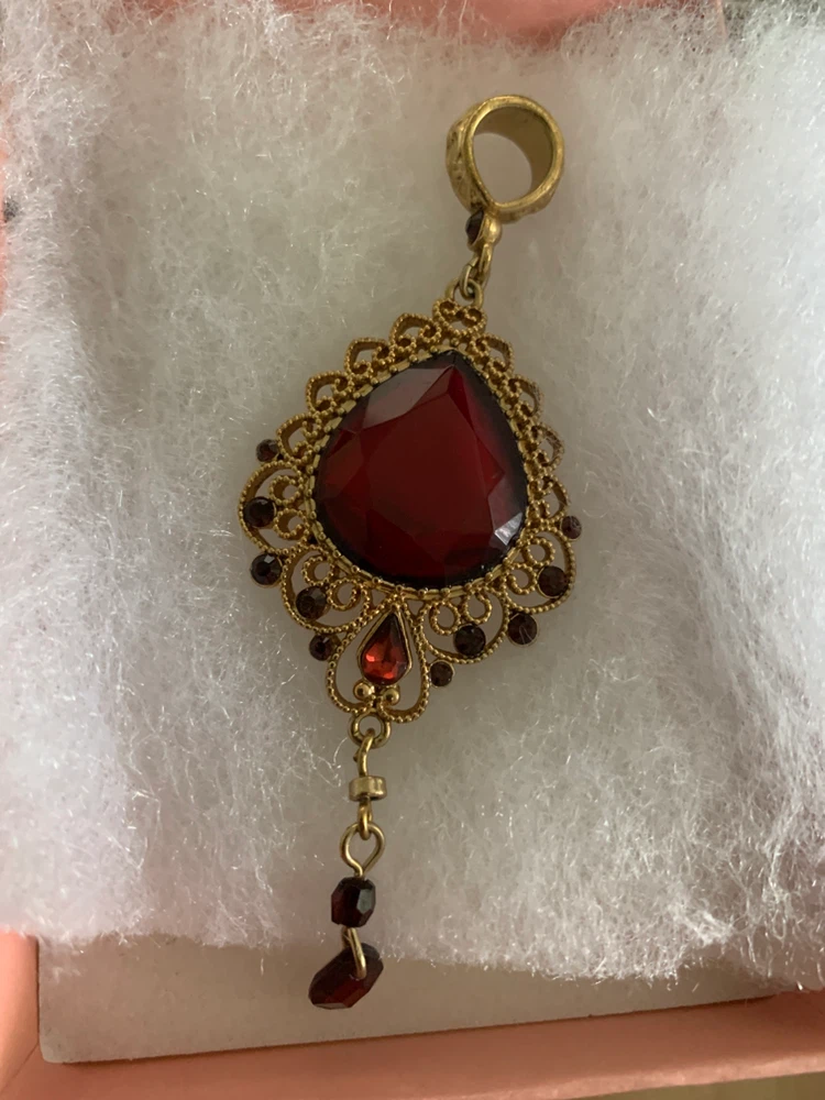 Gold-tone red gemstone dangle pendant