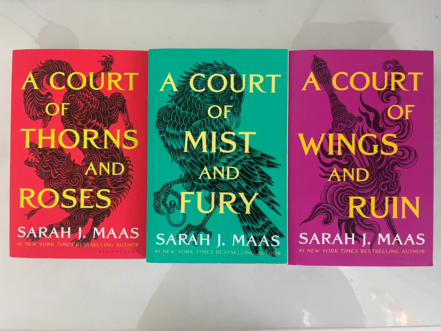 A Court of Thorns and Roses series by Sarah J. Maas