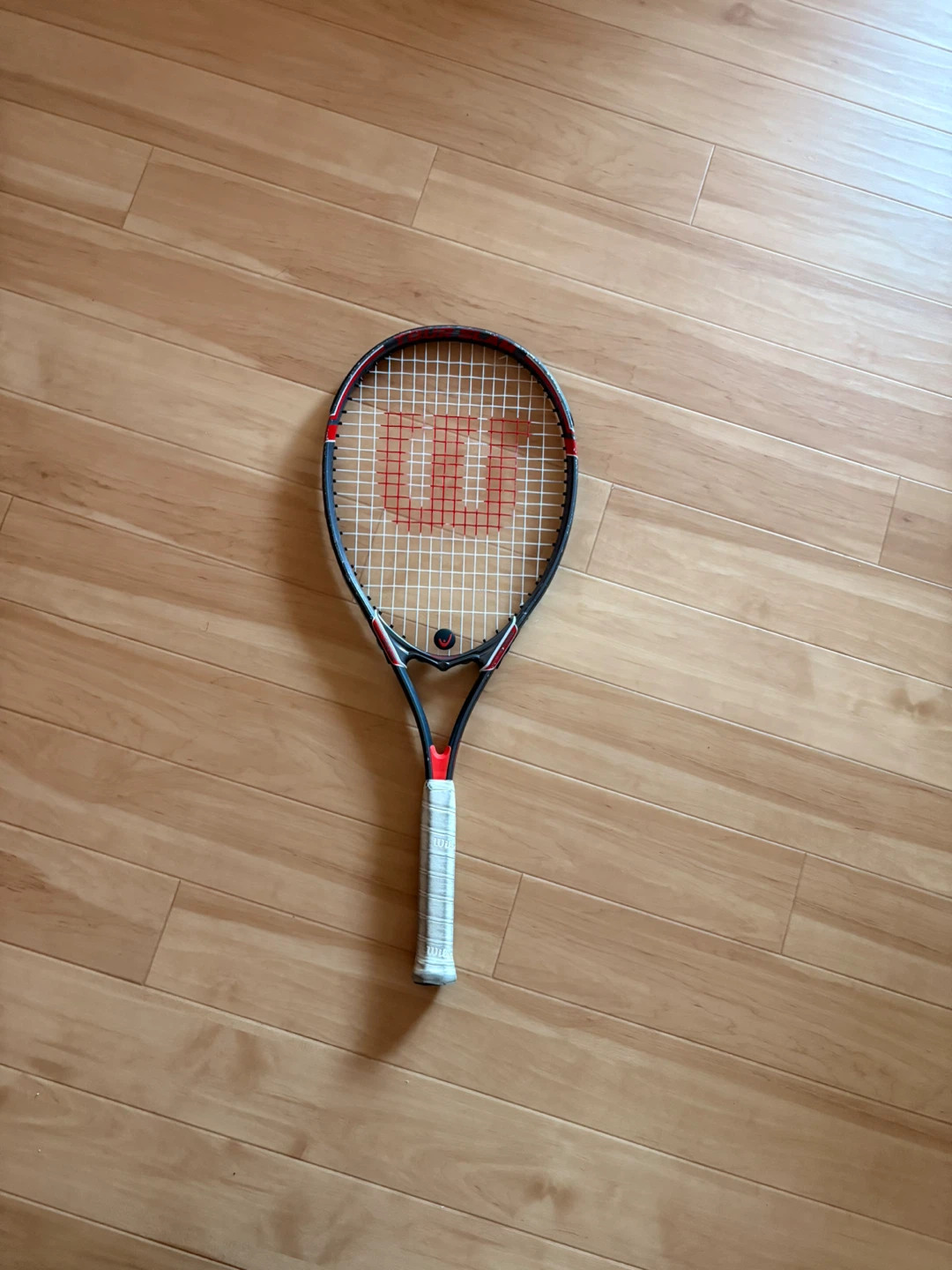 Two Wilson Tennis Racquets - Red & Blue