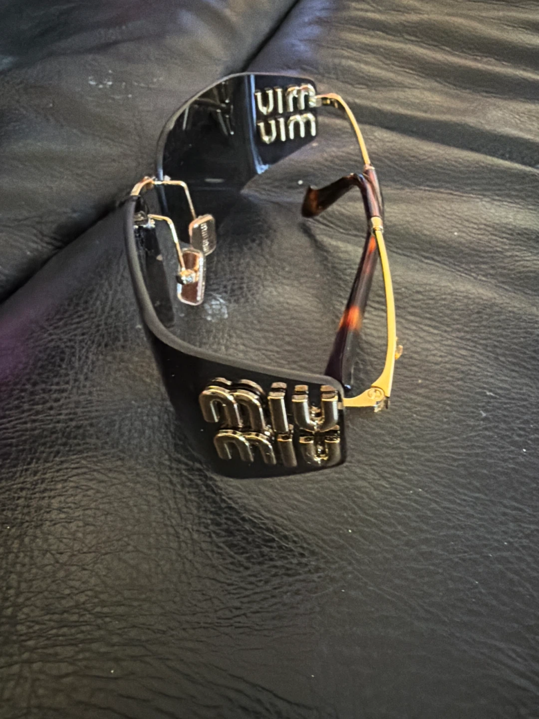 Miu Miu Sunglasses - photo 2
