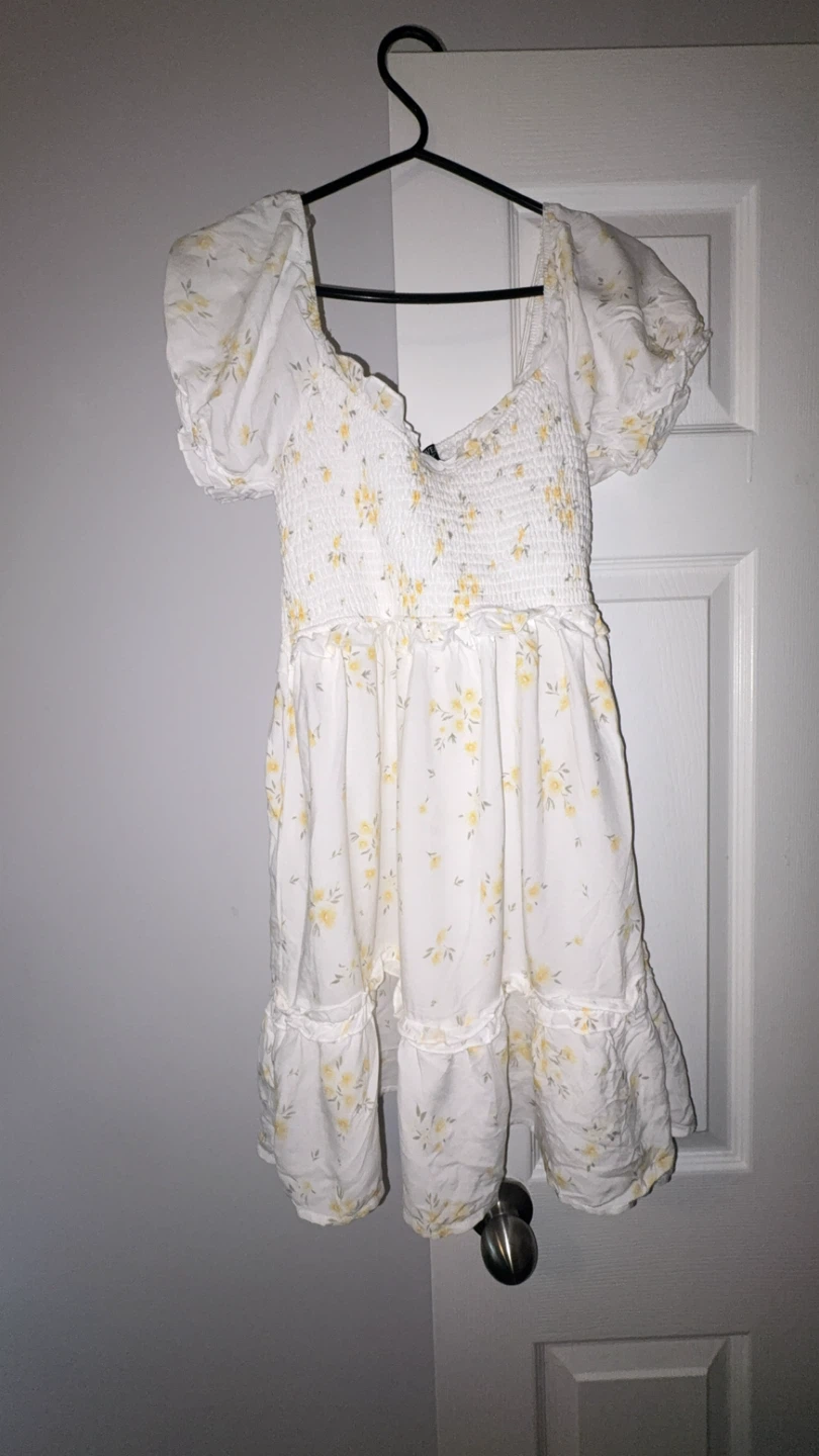 A yellow white floral summer dress