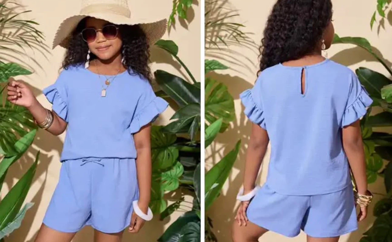 Girls Blue Ruffle Sleeve Top and Shorts Set. Size age 8