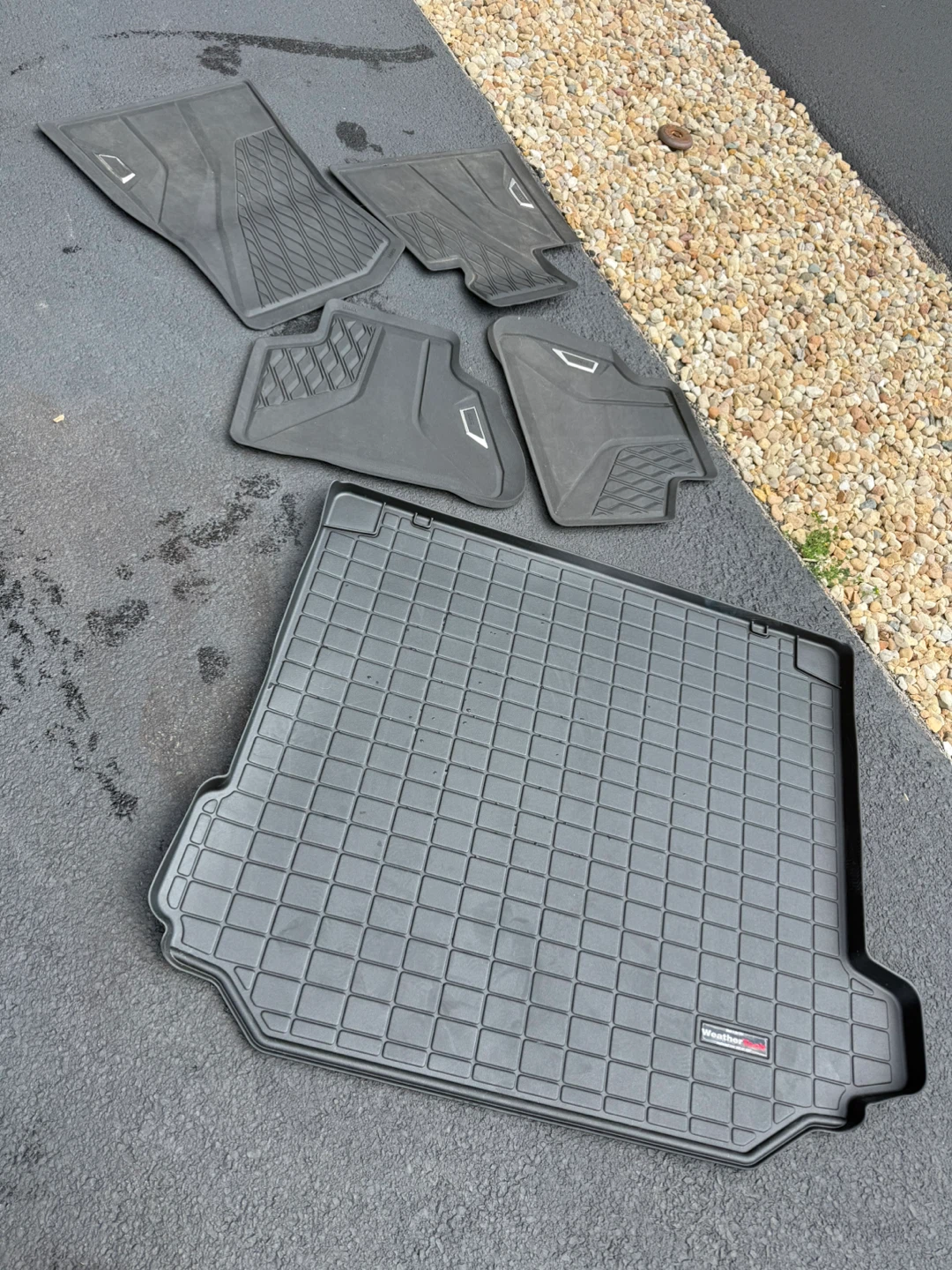 WeatherTech BMW X5 car mats and OEM mats