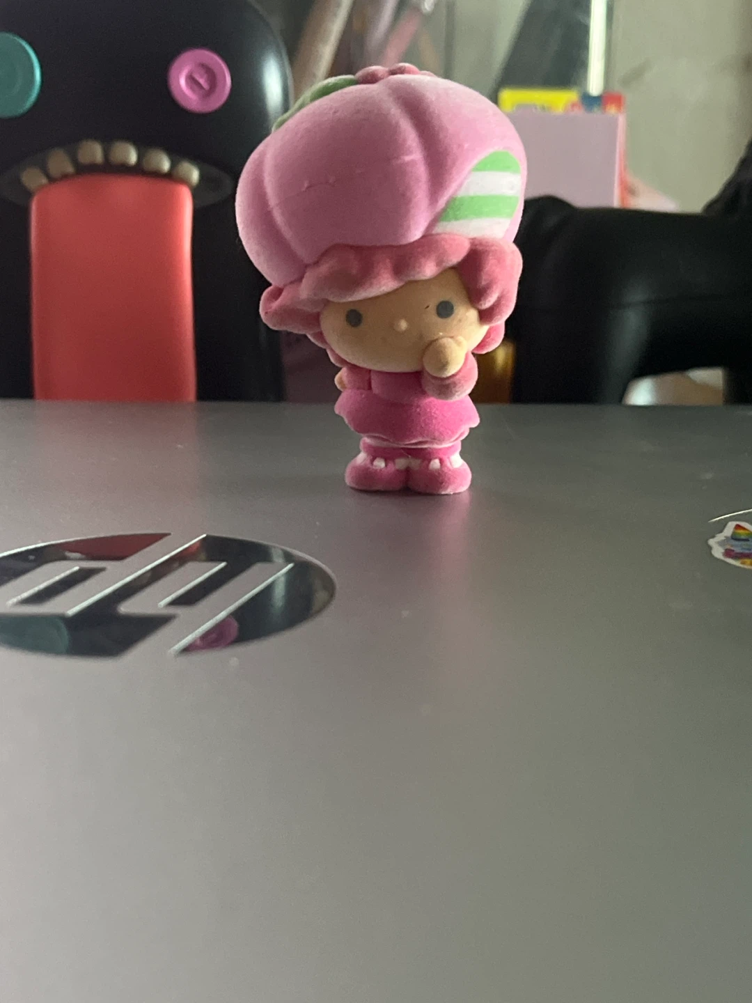 Mini strawberries, shortcake, fuzzy figurine