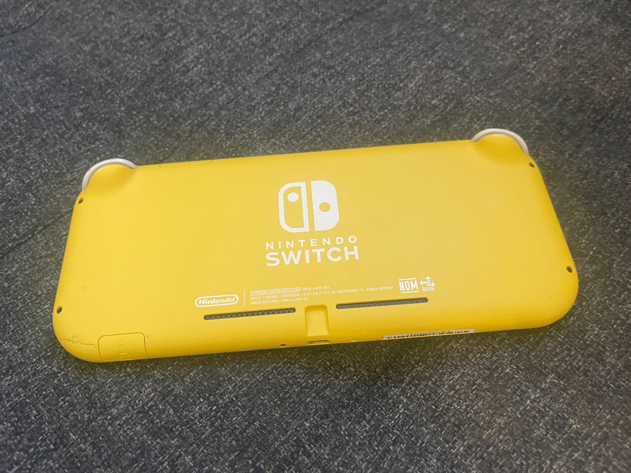 Nintendo Switch Lite Yellow Console + Mario Kart 8 Deluxe Game