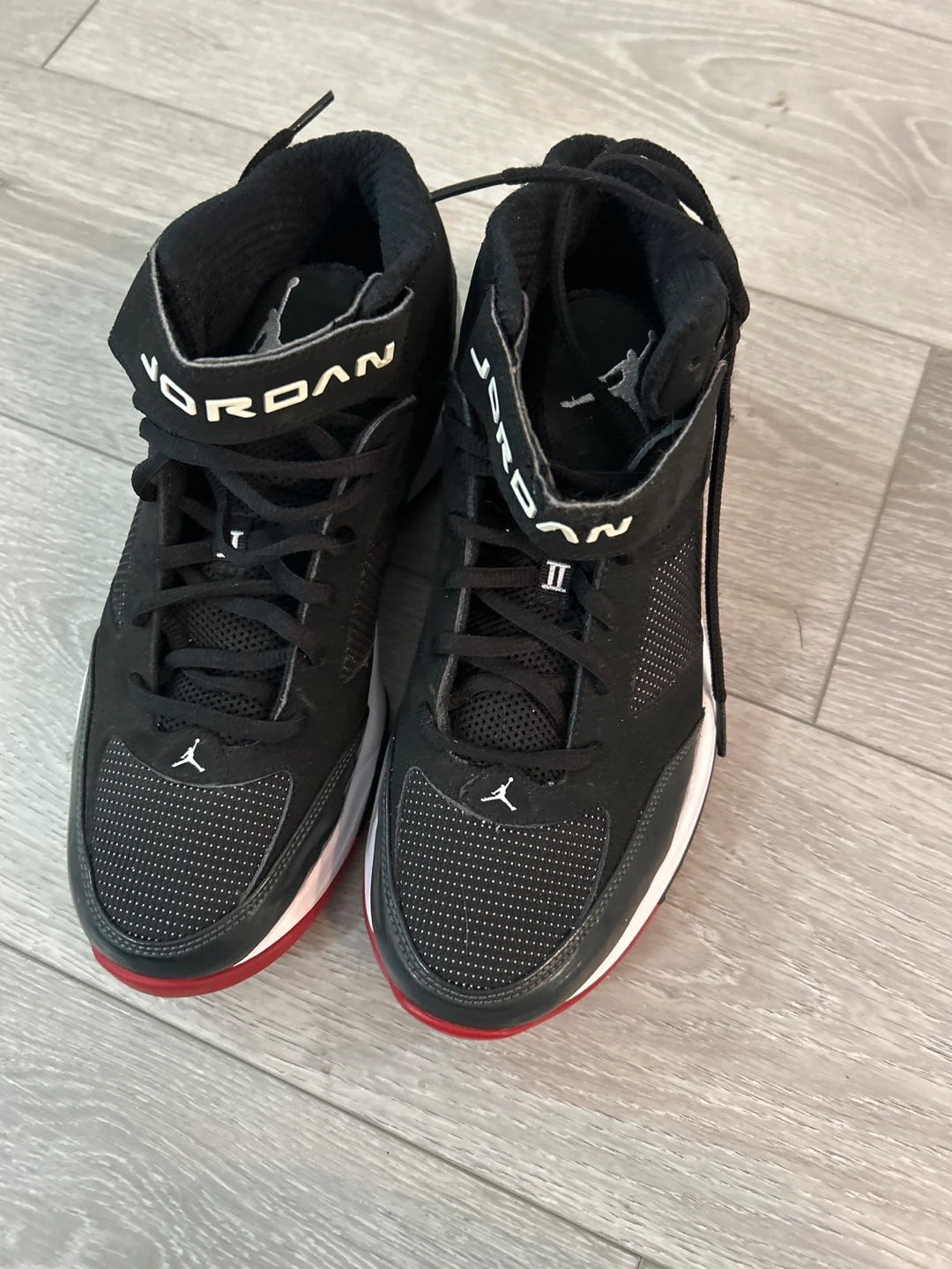 Jordan Black and Red High Top Sneakers
