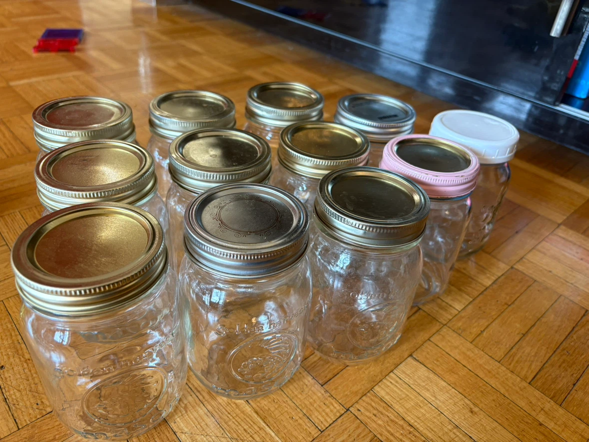 Collection of 12 Mason Jars with Lids