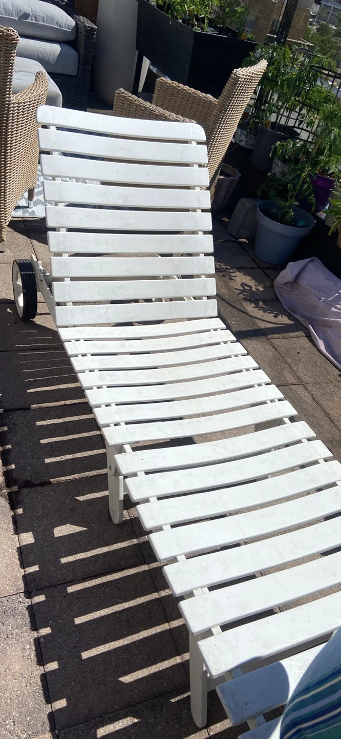 White Lounge Chair with Blue Striped Cushion