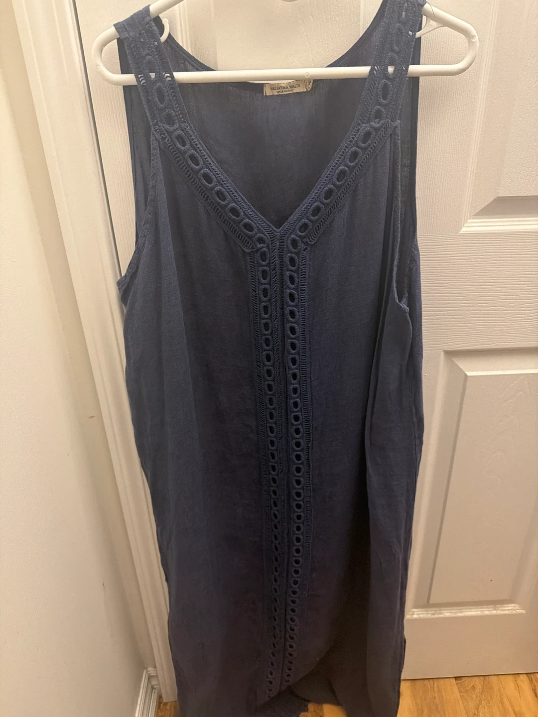 Blue sleeveless V-neck dress with eyelet details