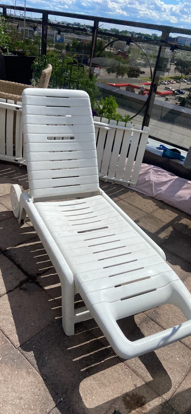 White Chaise Lounge Chair with Blue and White Striped Cushion