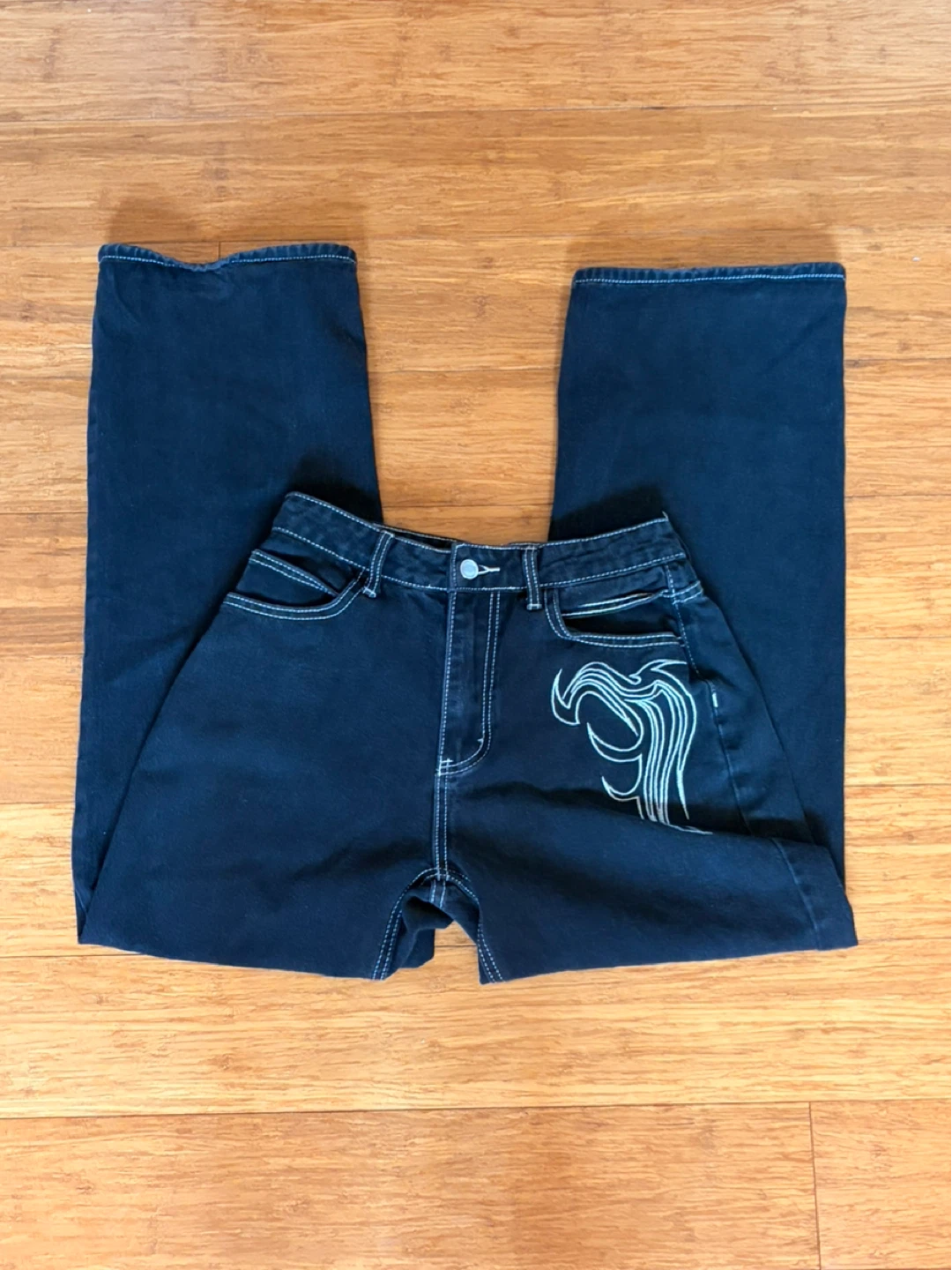 Winged baggy jeans