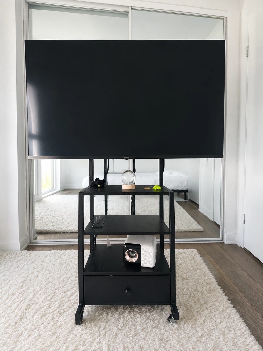 Black Rolling TV Stand with Drawer and Shelves