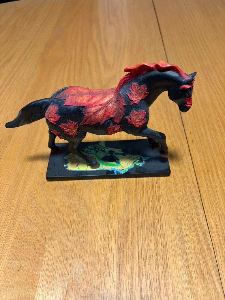 Decorative Horse Figurine with Maple Leaf Design