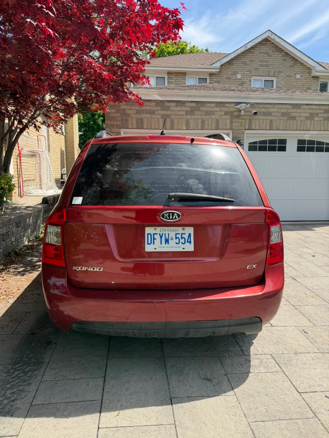 Red Kia Rondo