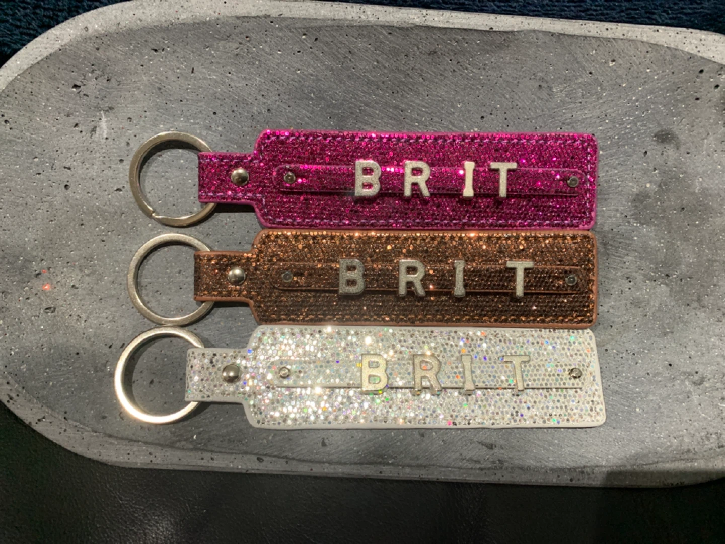 Glittery BRIT Keychains ❤️ 8 dollars Each