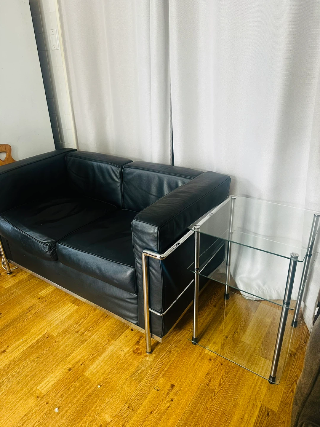 Glass and Chrome End Table and sofa