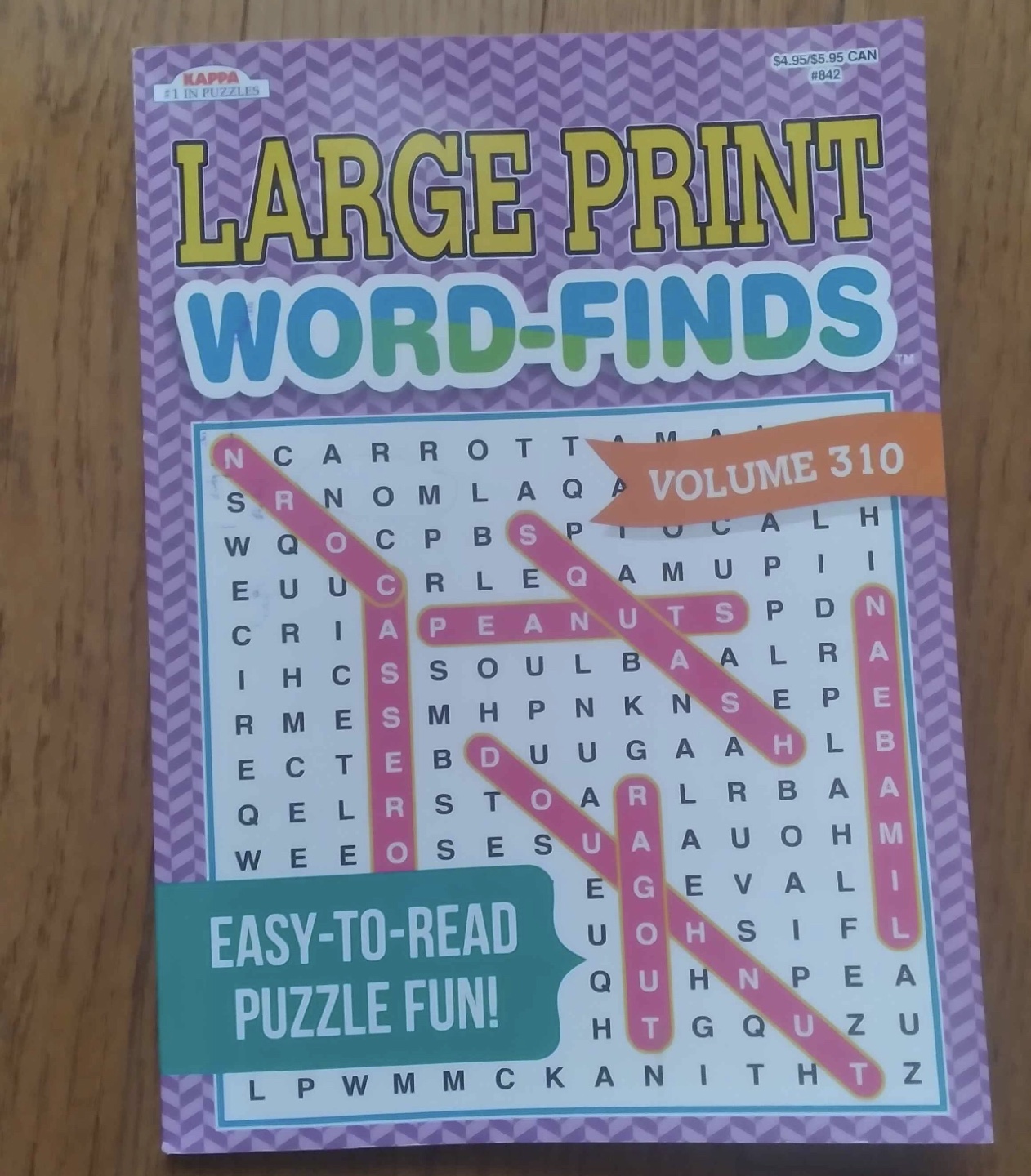 Large print word find book.  One page has been completed.  $1