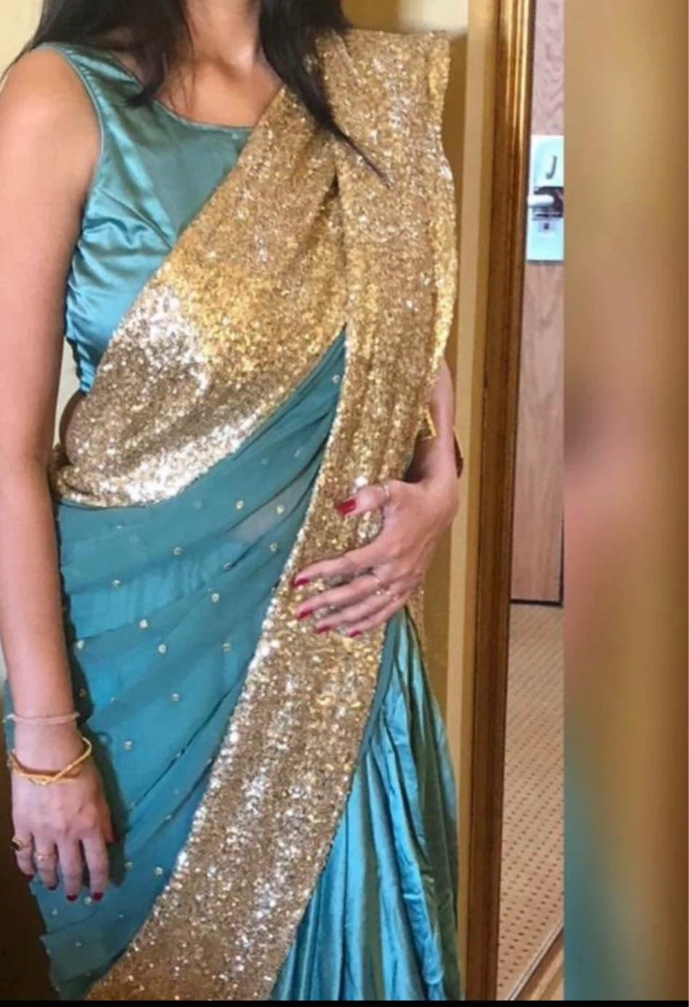 PrepleatedTeal Saree with Gold Sequin Border