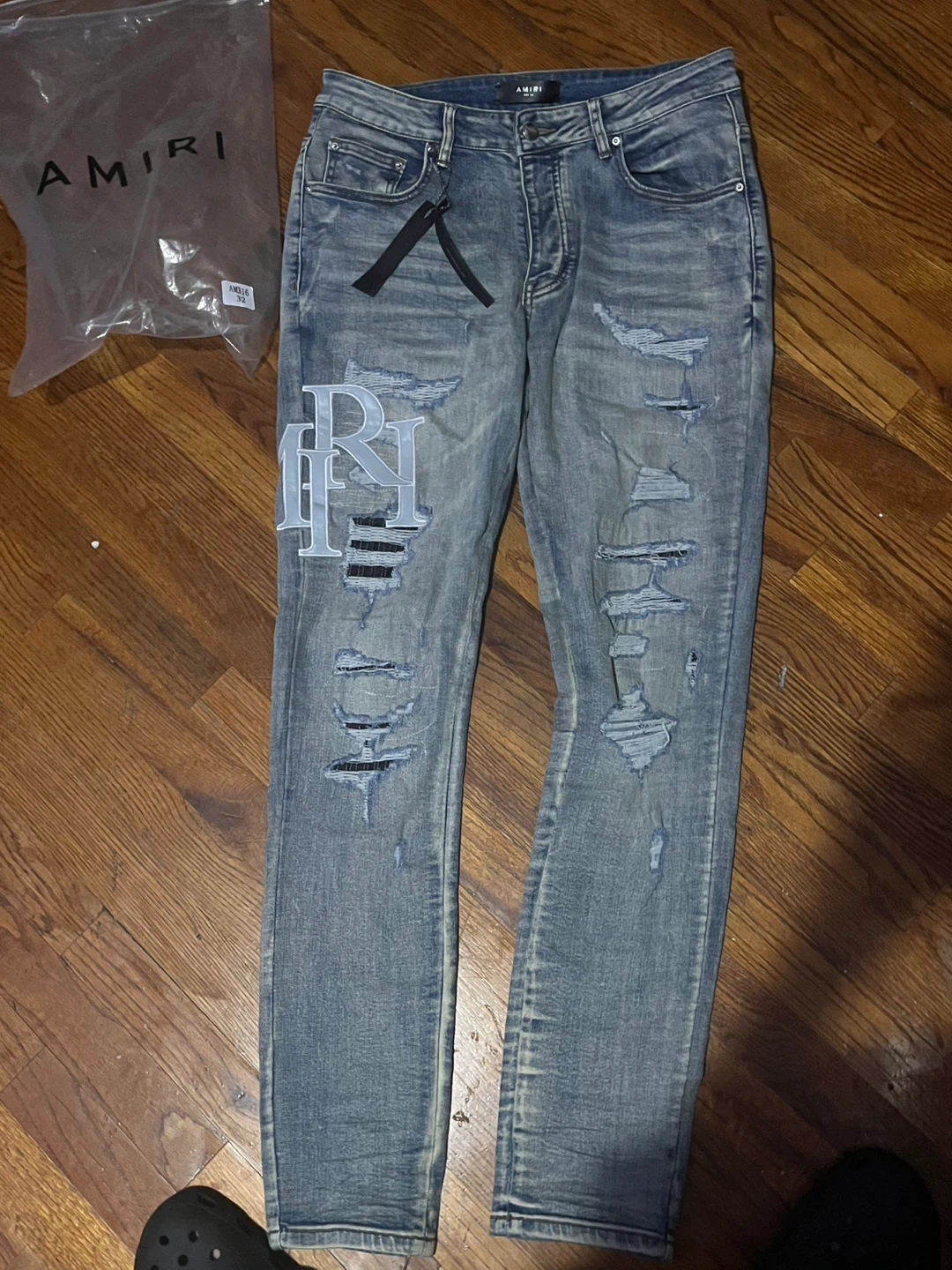 AMIRI Distressed Logo Jeans - photo 2