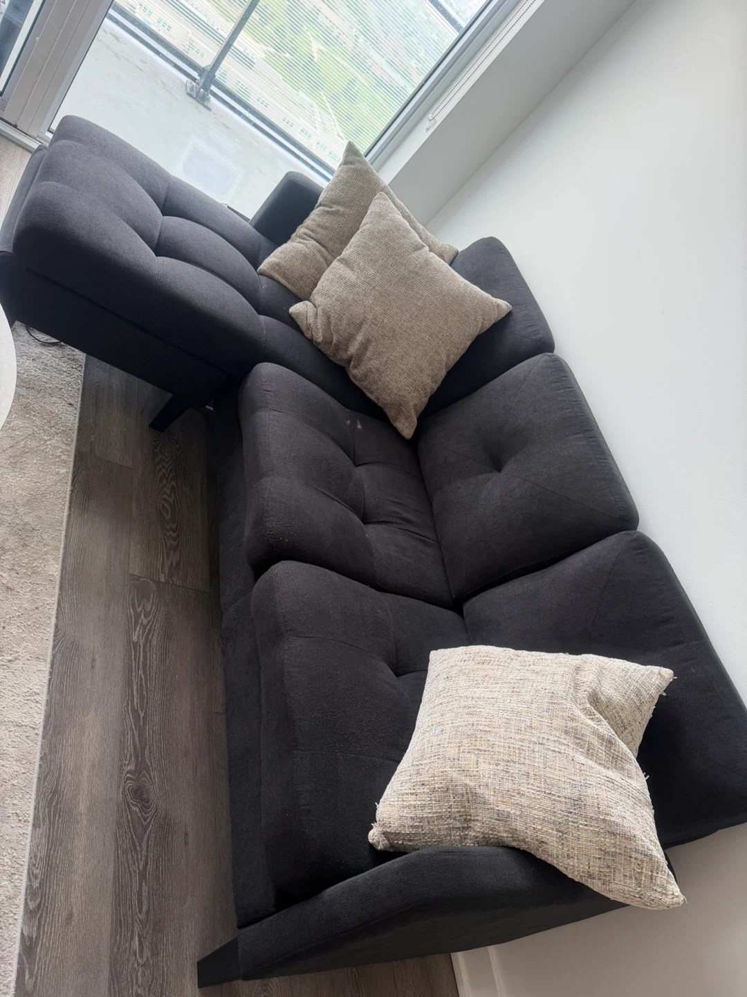 L-Shaped Black Sectional Sofa with Tufted Cushions - photo 2