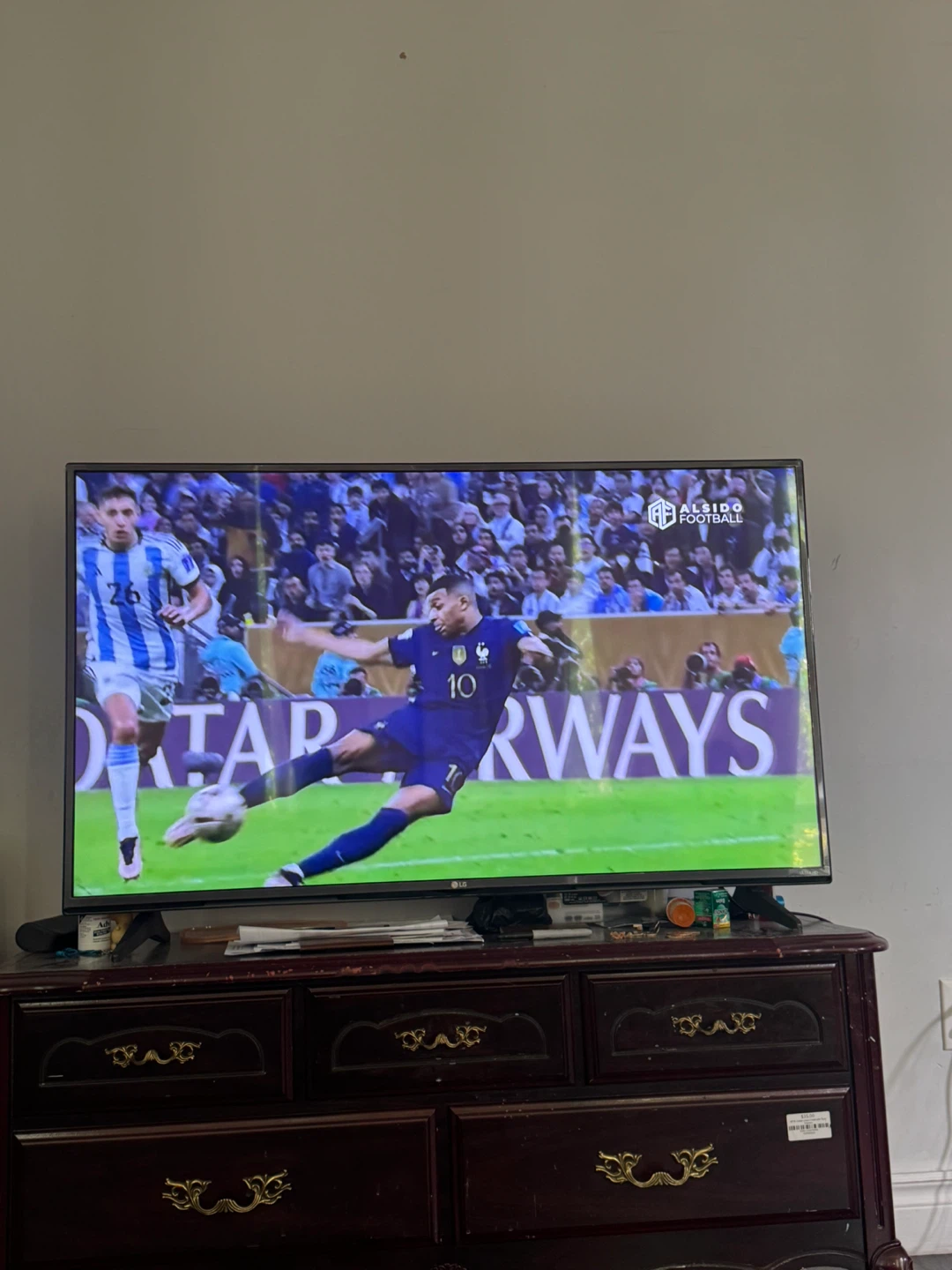 LG Television Showing Football Match