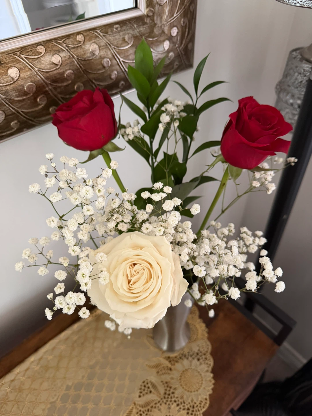 Vase with fresh Roses and Baby's Breath