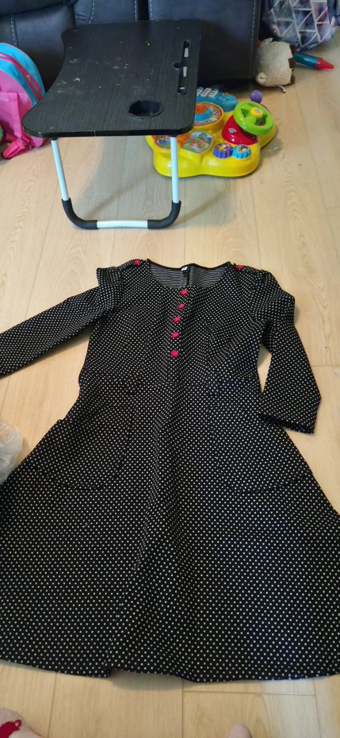 Black polka dot dress with red buttons