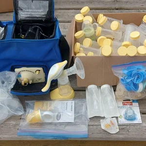 Medela Harmony Breast Pump with Accessories and Storage Bag