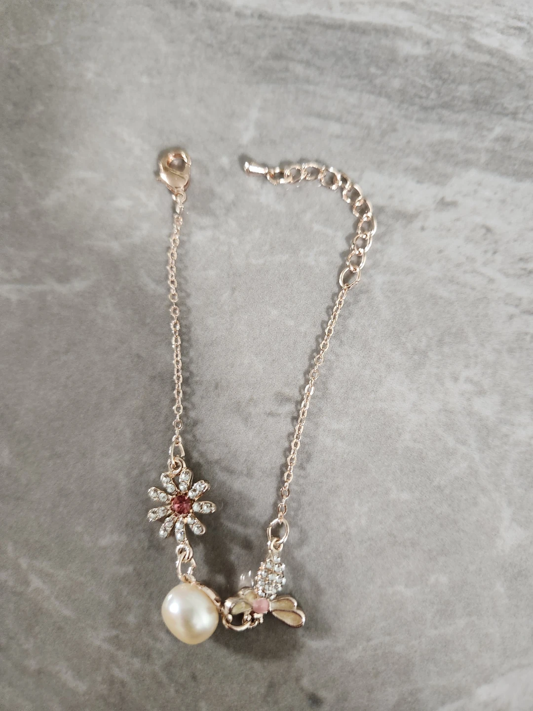 Rose Gold Tone Bracelet with Daisy Charm
