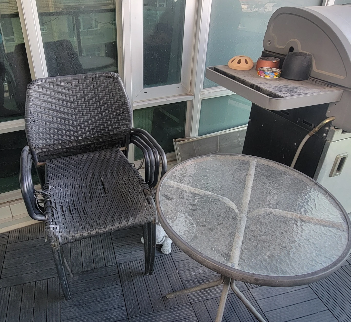 Bistro style glass patio table with 4 chairs