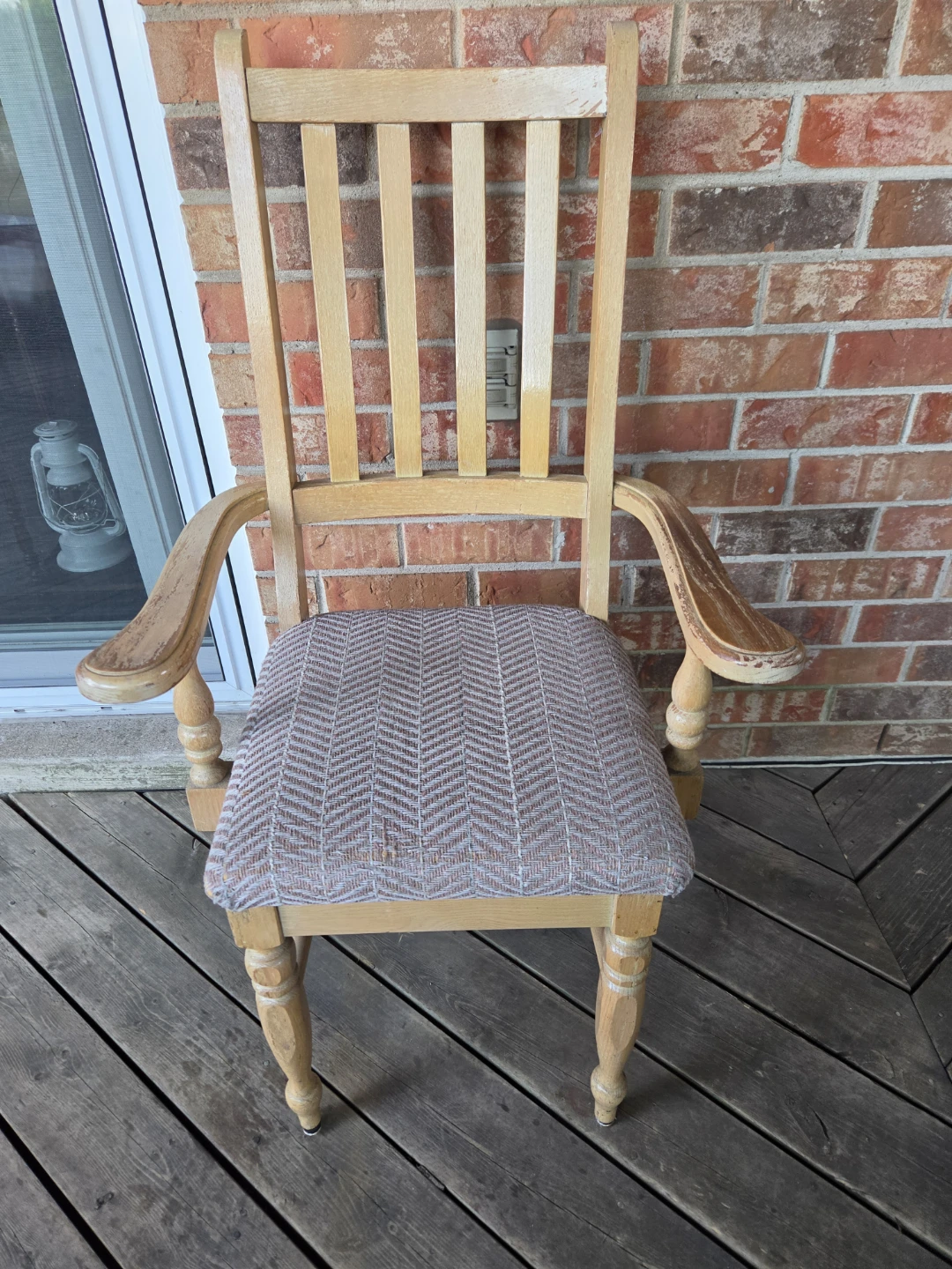 Wooden armchair with upholstered seat