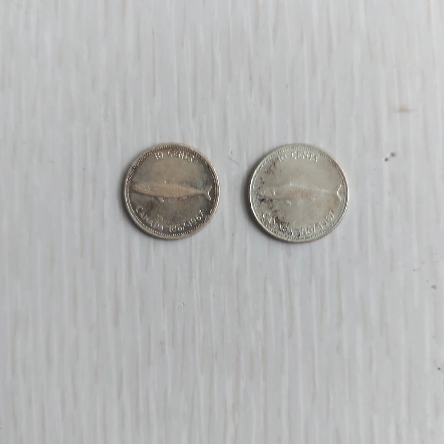 Two 1957 Canadian 10 Cent Coins
