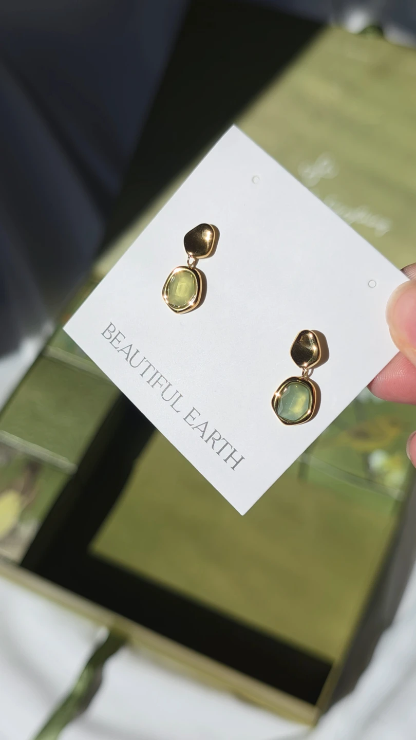 Beautiful Earth Gold Tone Drop Earrings with Green Stones