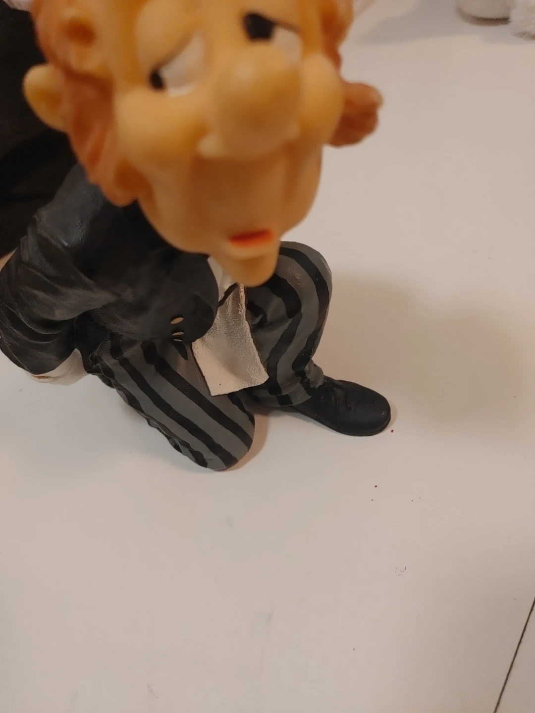 Figurine of a man in a suit