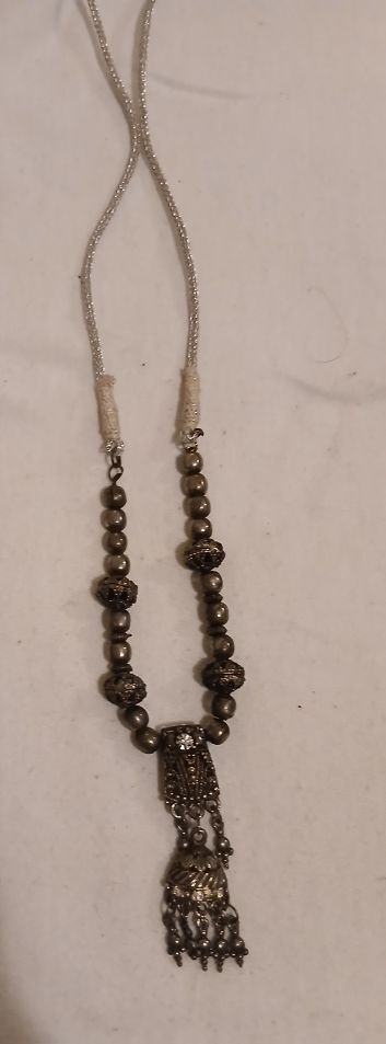 Beaded Necklace with Bell Pendant
