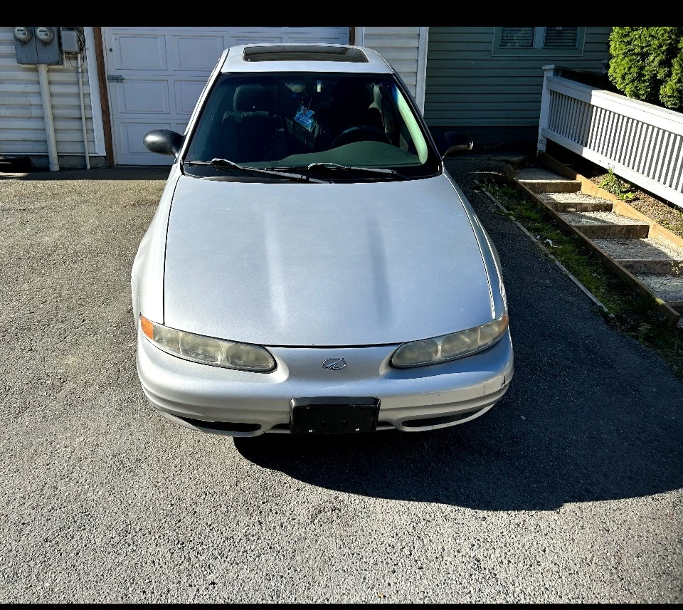 Silver Oldsmobile Alero Sedan