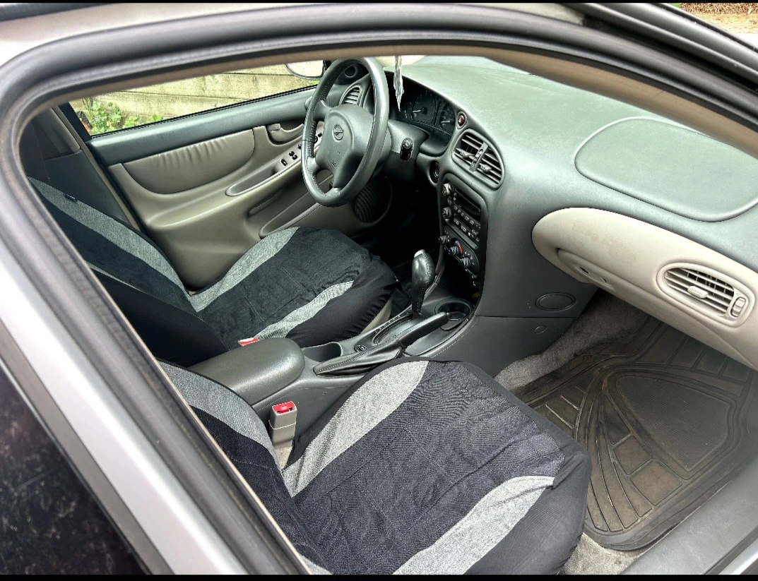 Silver Oldsmobile Alero Sedan - photo 4