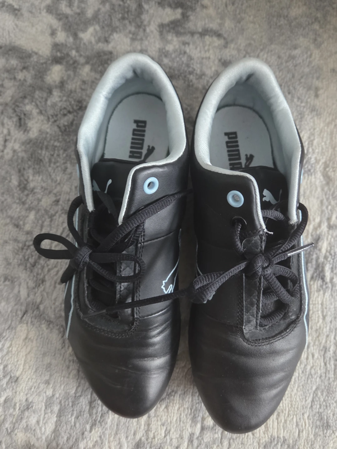 Puma Black Sneakers with Light Blue Accents