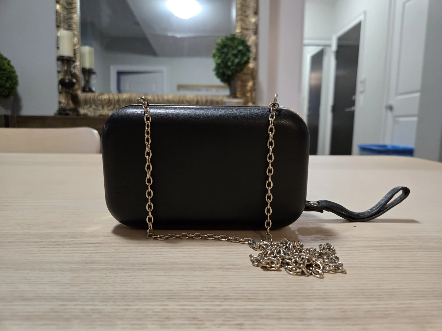 Black small clutch with chain strap
