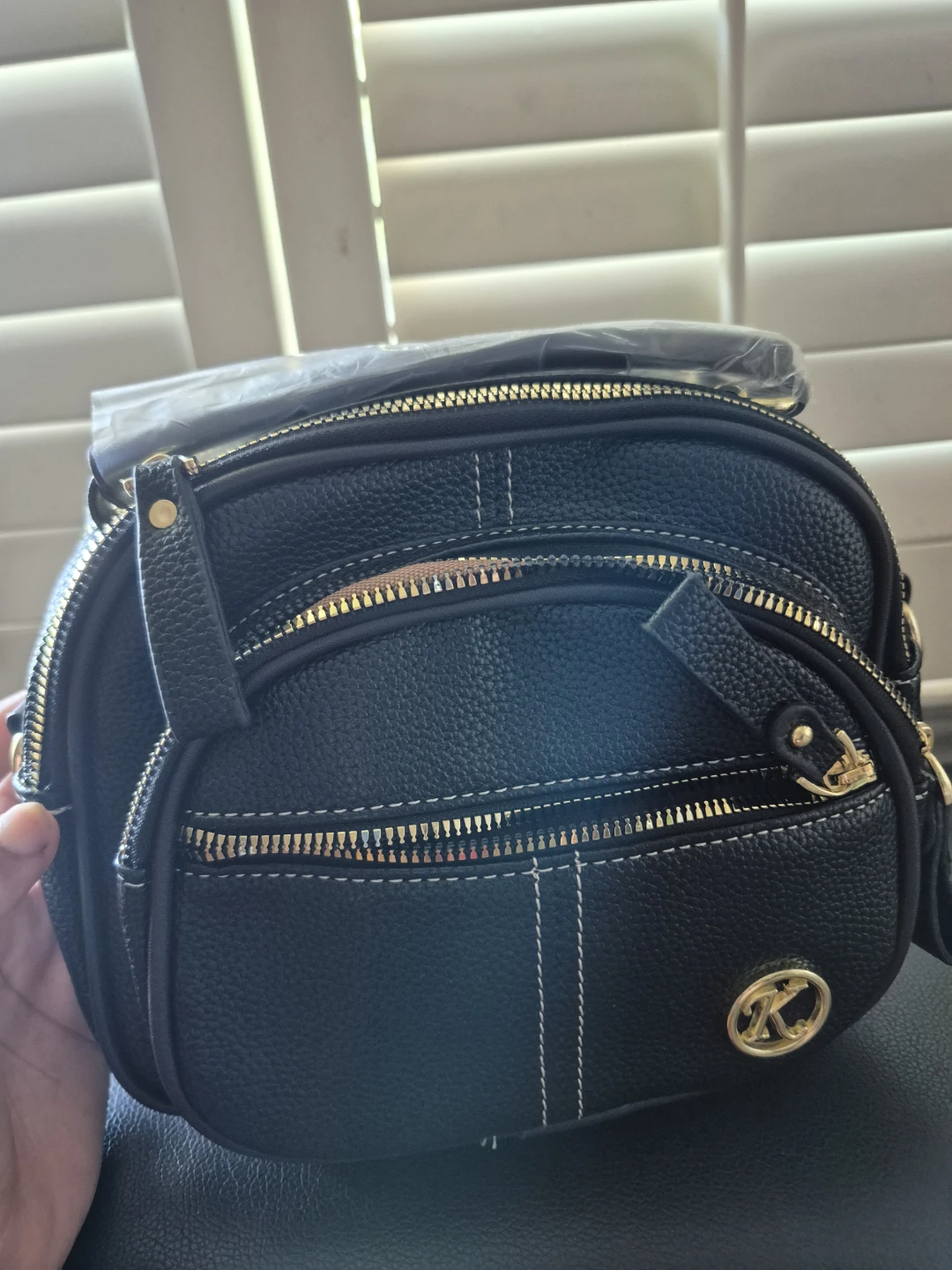 Black Faux Leather Crossbody Bag with Gold Accents