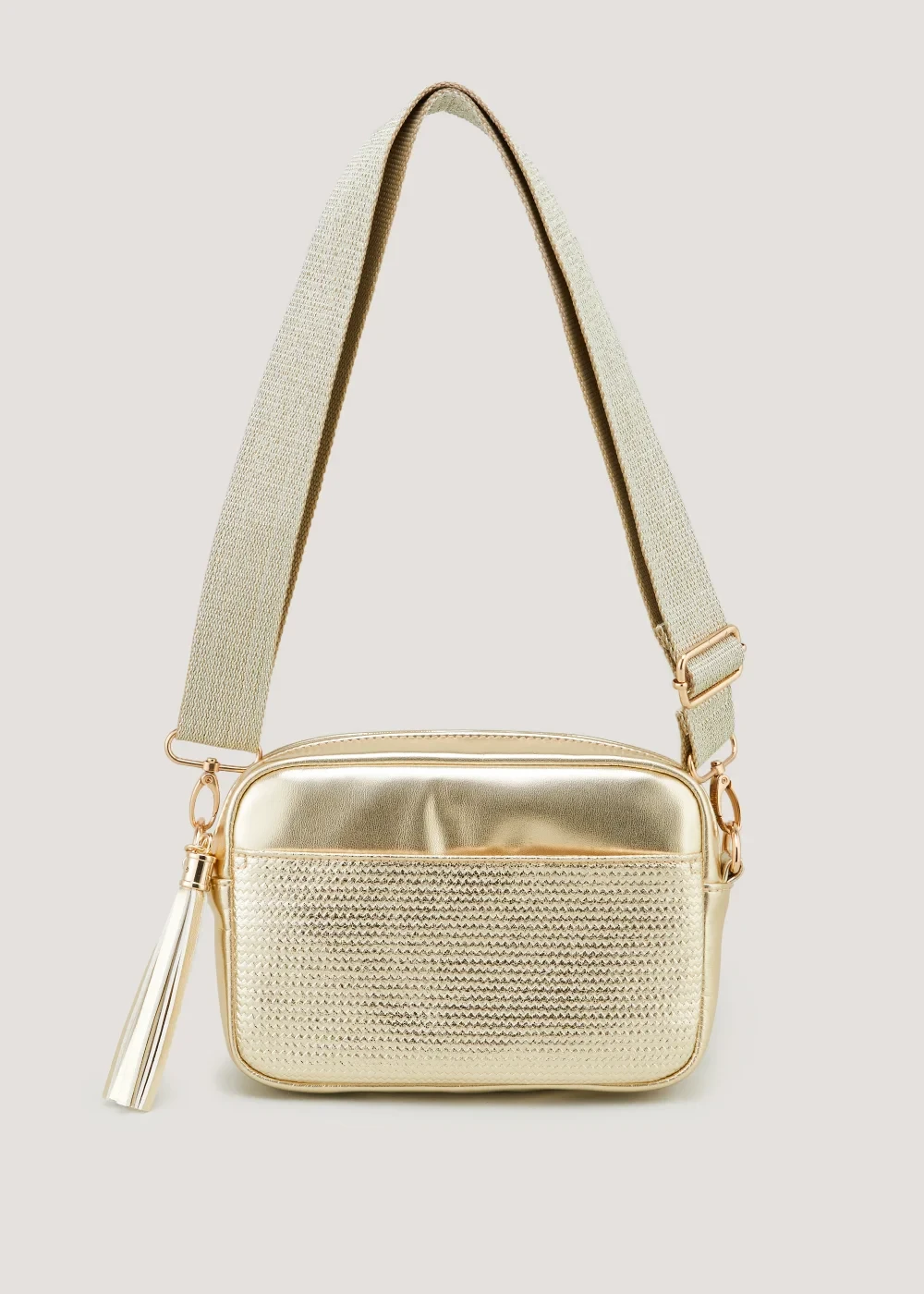 Gold crossbody purse with tassel